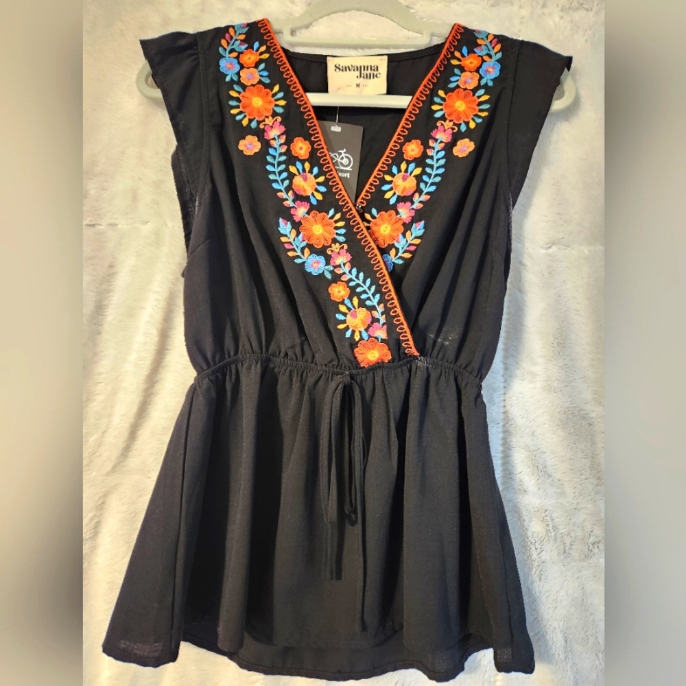 Embroidered Peplum Top